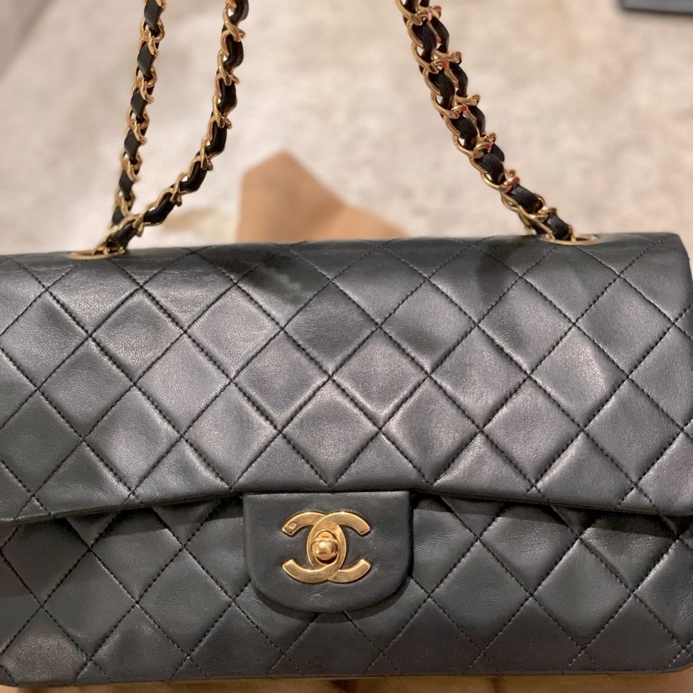 Classic Chanel flap bag black lamb skin leather